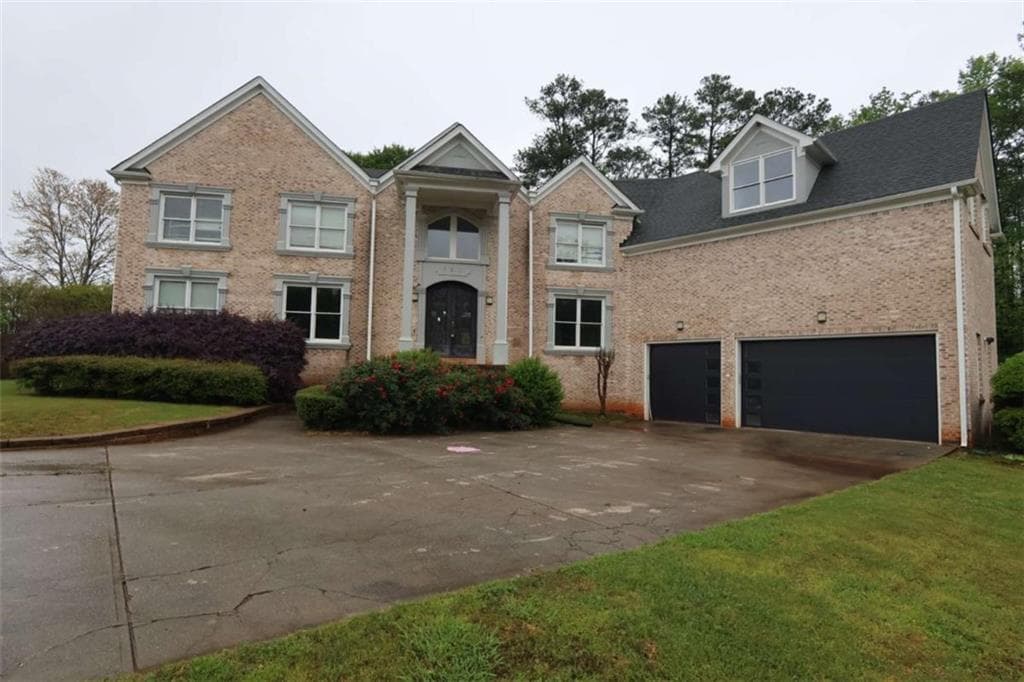 7 bedroom, 4 bathroom single family residence sold at 168 Harmony Grove Road, Lilburn, GA 30047