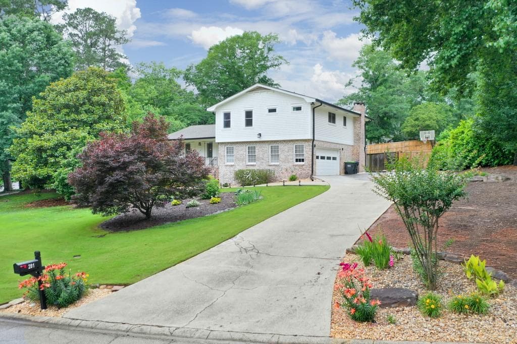 4 bedroom, 3 bathroom, 2,438 sq ft single family residence sold at 281 Lakeshore Drive, Marietta, GA 30067