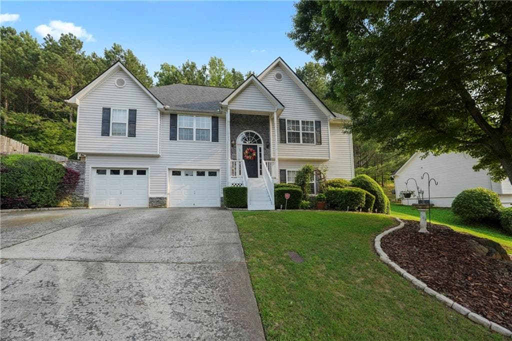 4 bedroom, 3 bathroom, 2,509 sq ft single family residence sold at 107 Hearthstone Walk, Woodstock, GA 30189
