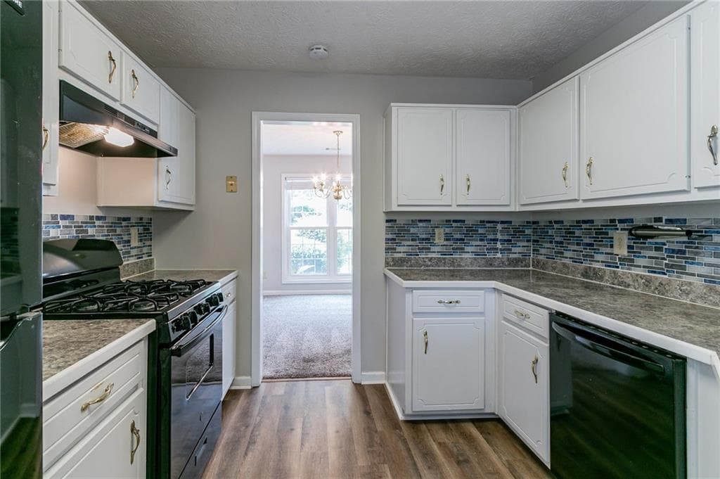 4 bedroom, 3 bathroom, 1,674 sq ft single family residence for sale at 12015 Harbour Town Parkway, Fayetteville, GA 30215 — photo 4