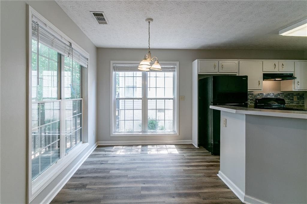 4 bedroom, 3 bathroom, 1,674 sq ft single family residence for sale at 12015 Harbour Town Parkway, Fayetteville, GA 30215 — photo 7