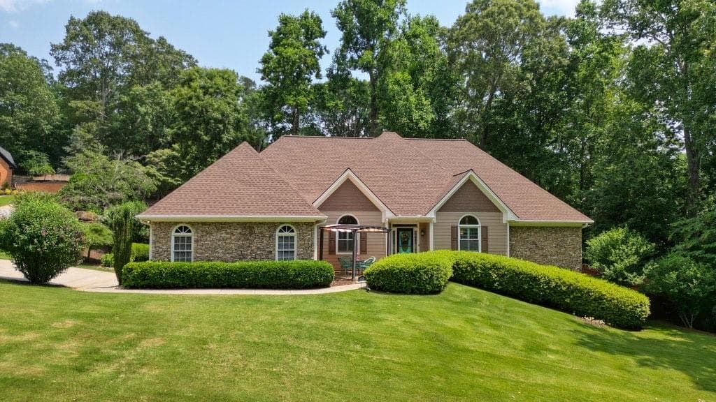 4 bedroom, 4 bathroom, 4,444 sq ft single family residence sold at 115 Windover Court, Roswell, GA 30075
