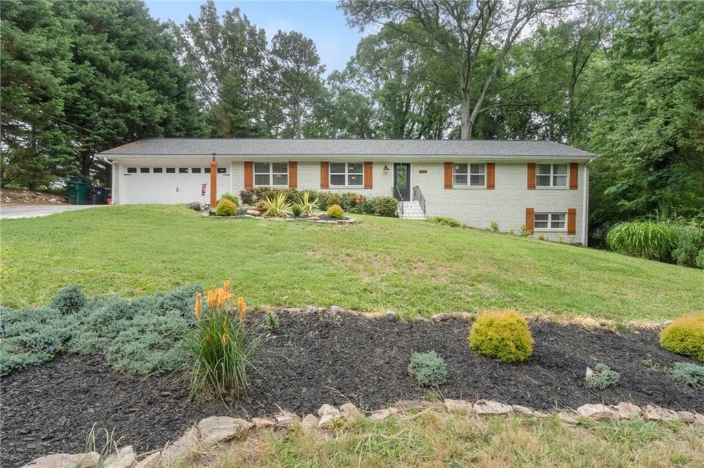 4 bedroom, 2 bathroom, 2,160 sq ft single family residence sold at 2109 Allgood Road, Marietta, GA 30062