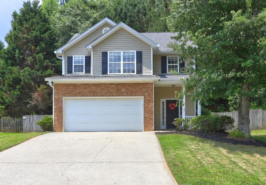 4 bedroom, 3 bathroom, 1,864 sq ft single family residence sold at 112 Lexington Parke Drive, Woodstock, GA 30189