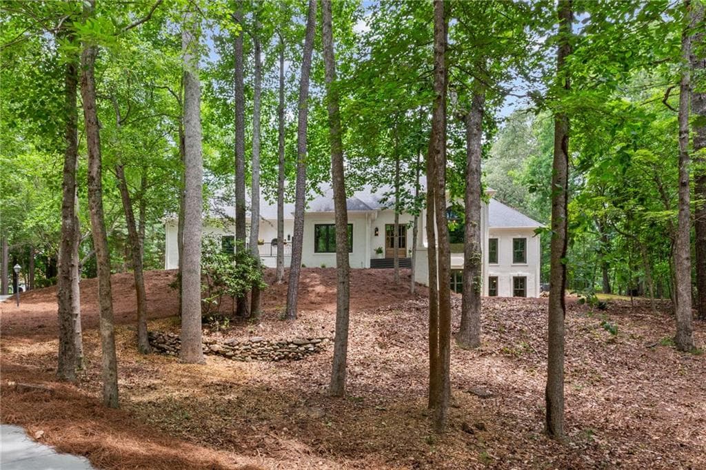 6 bedroom, 5 bathroom, 5,873 sq ft single family residence sold at 12995 Bucksport Drive, Roswell, GA 30075