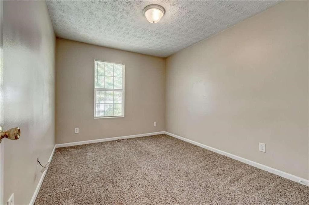 3 bedroom, 3 bathroom, 1,339 sq ft townhouse for sale at 2289 Strathmoor Manor Drive, Lithonia, GA 30058 — photo 9