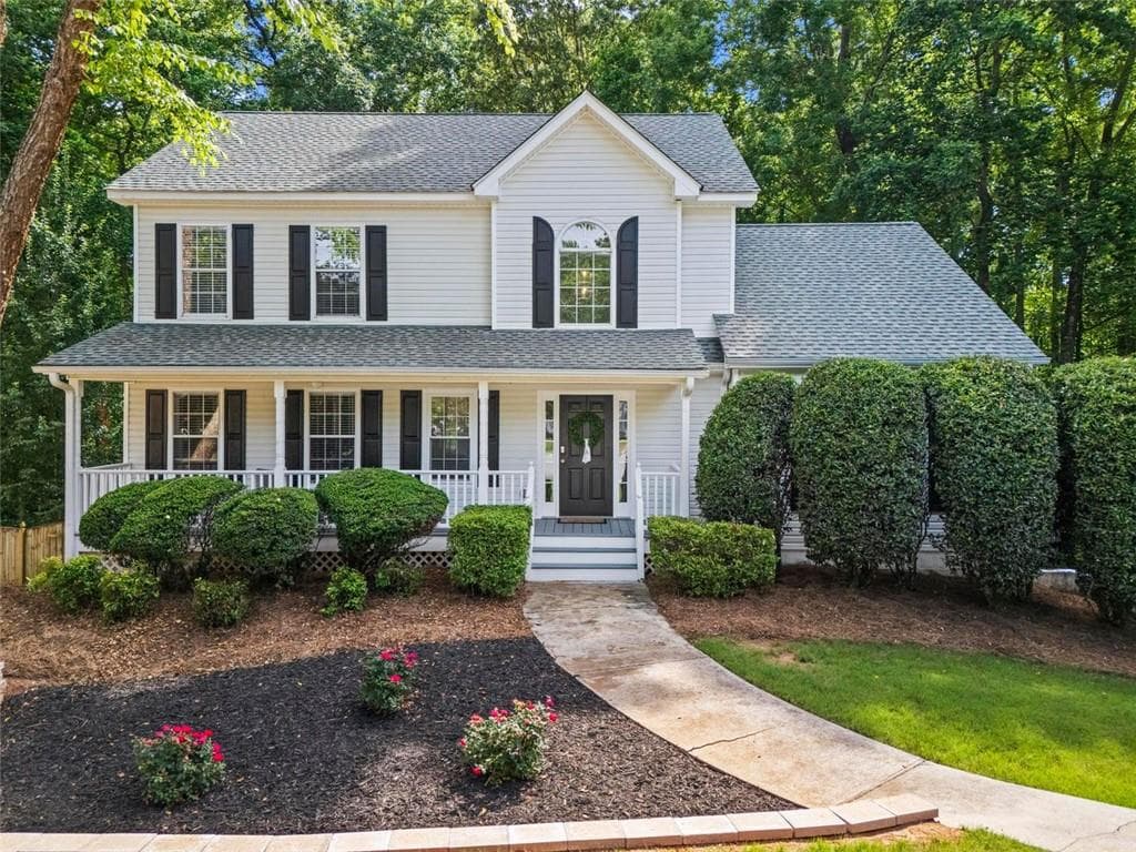4 bedroom, 3 bathroom, 2,431 sq ft single family residence sold at 6065 Ashbury Lane, Cumming, GA 30028