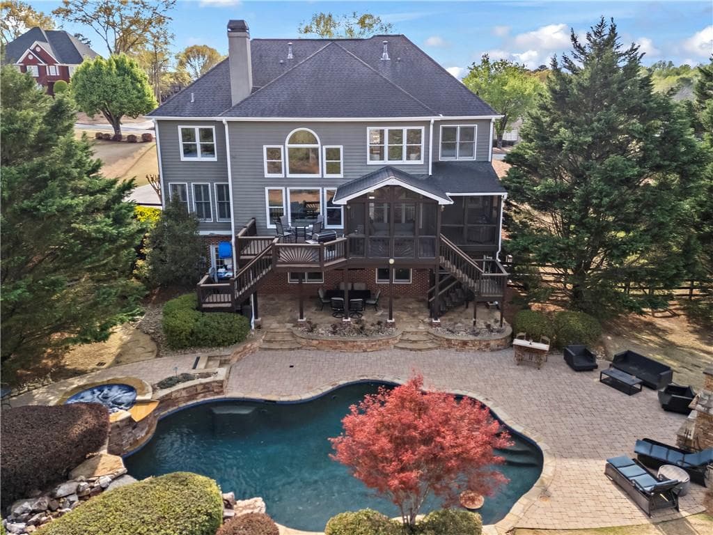 5 bedroom, 5 bathroom, 5,113 sq ft single family residence sold at 410 Hickory Fairway Court, Woodstock, GA 30188