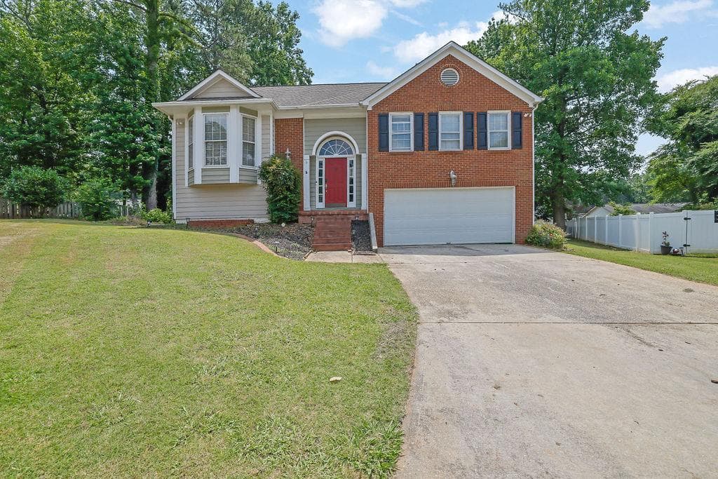 5 bedroom, 3 bathroom, 2,675 sq ft single family residence sold at 1010 San Marcos Cove, Lawrenceville, GA 30043