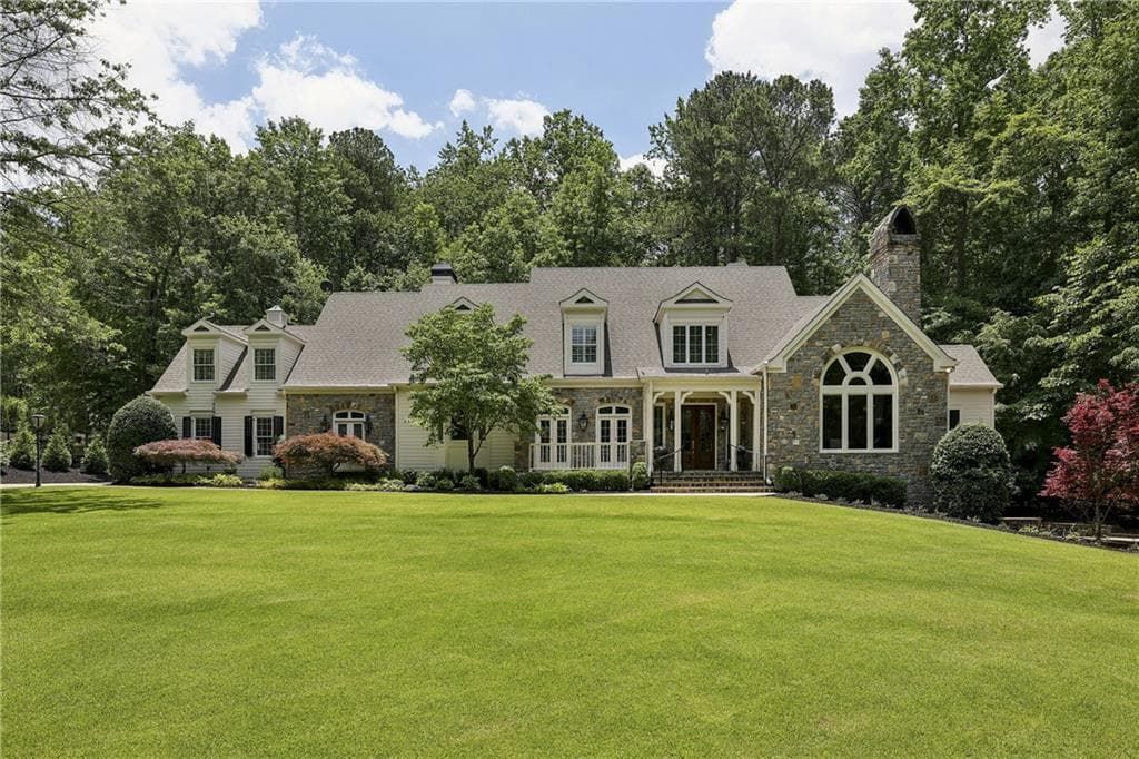 5 bedroom, 6 bathroom, 7,166 sq ft single family residence sold at 315 Crooked Stick Drive, Milton, GA 30004