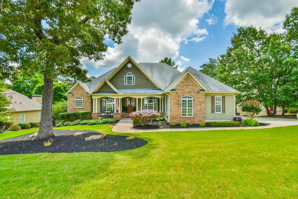 4 bedroom, 3 bathroom, 6,003 sq ft single family residence sold at 7335 Sawgrass Drive, Dawsonville, GA 30534