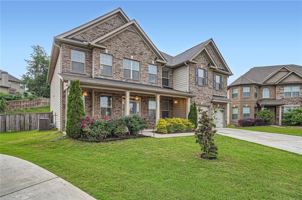 5 bedroom, 4 bathroom, 3,918 sq ft single family residence sold at 5445 Whisper Court, Cumming, GA 30028