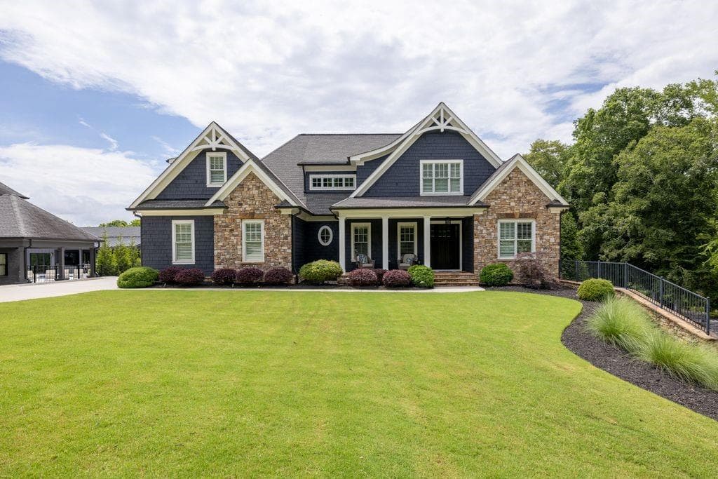 7 bedroom, 6 bathroom, 6,088 sq ft single family residence sold at 481 Meadow Lake Terrace, Hoschton, GA 30548