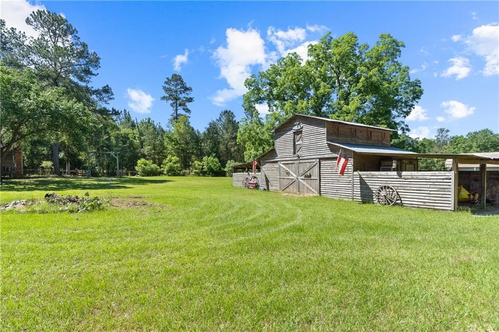 6 bedroom, 6 bathroom, 4,561 sq ft single family residence sold at 2780 Balerma Church Road, Sparta, GA 31087