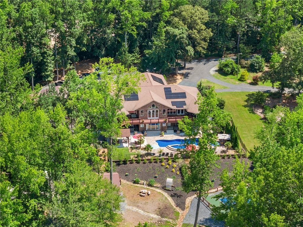 6 bedroom, 7 bathroom, 6,847 sq ft single family residence sold at 1572 Azalea Drive, Lawrenceville, GA 30043