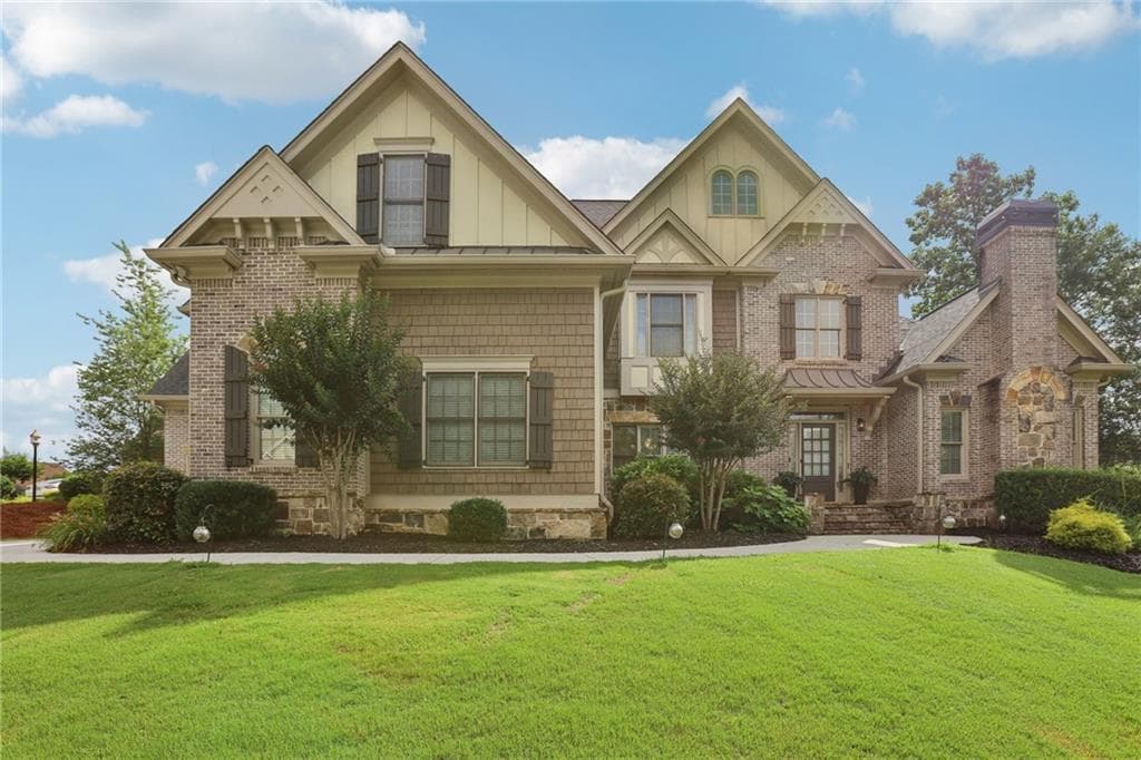 4 bedroom, 5 bathroom, 5,500 sq ft single family residence sold at 3099 Hidden Falls Drive, Buford, GA 30519