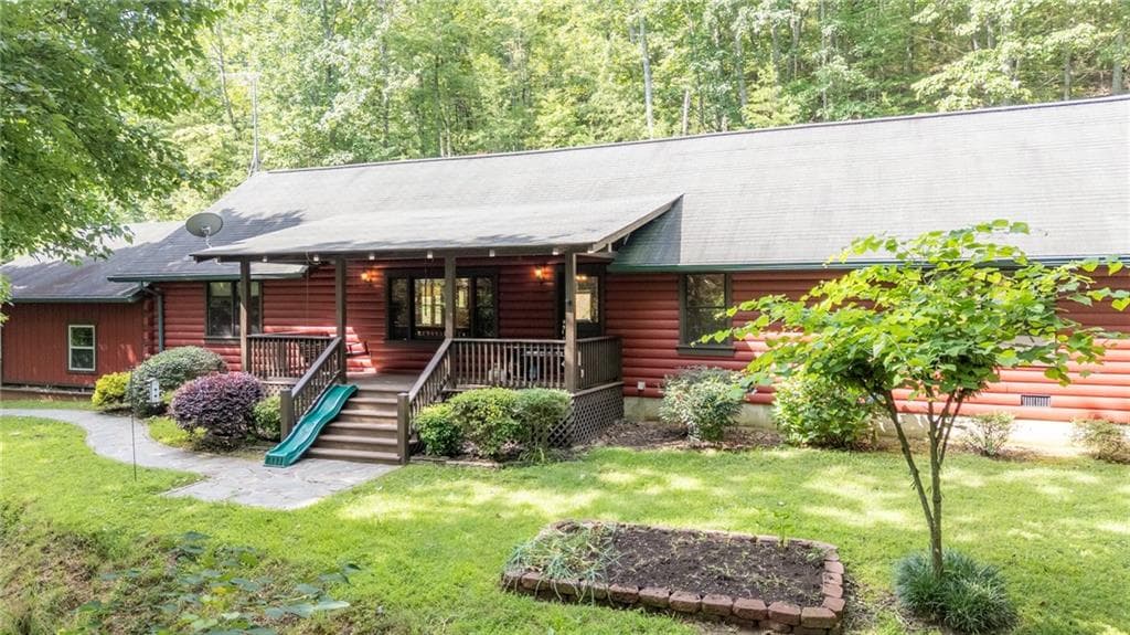 3 bedroom, 2 bathroom, 2,016 sq ft single family residence sold at 709 Deerfield Lane, Sugar Valley, GA 30746