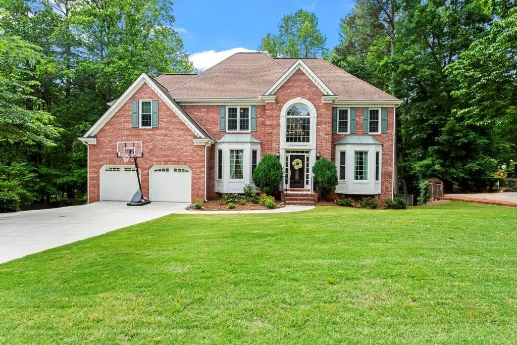 5 bedroom, 3 bathroom, 4,561 sq ft single family residence sold at 1297 Ashworth Avenue, Marietta, GA 30064