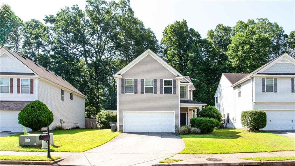 4 bedroom, 3 bathroom, 2,076 sq ft single family residence for sale at 4628 McEver View Drive, Sugar Hill, GA 30518 — photo 1 of 30