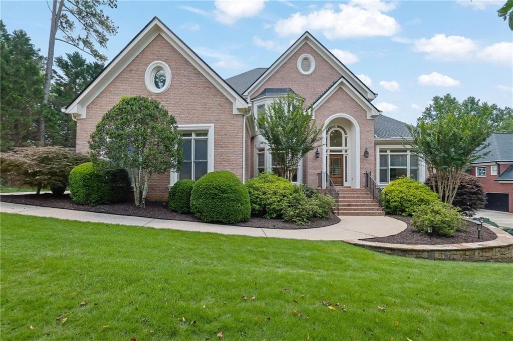 5 bedroom, 6 bathroom, 5,730 sq ft single family residence sold at 910 Burren Drive, Alpharetta, GA 30004