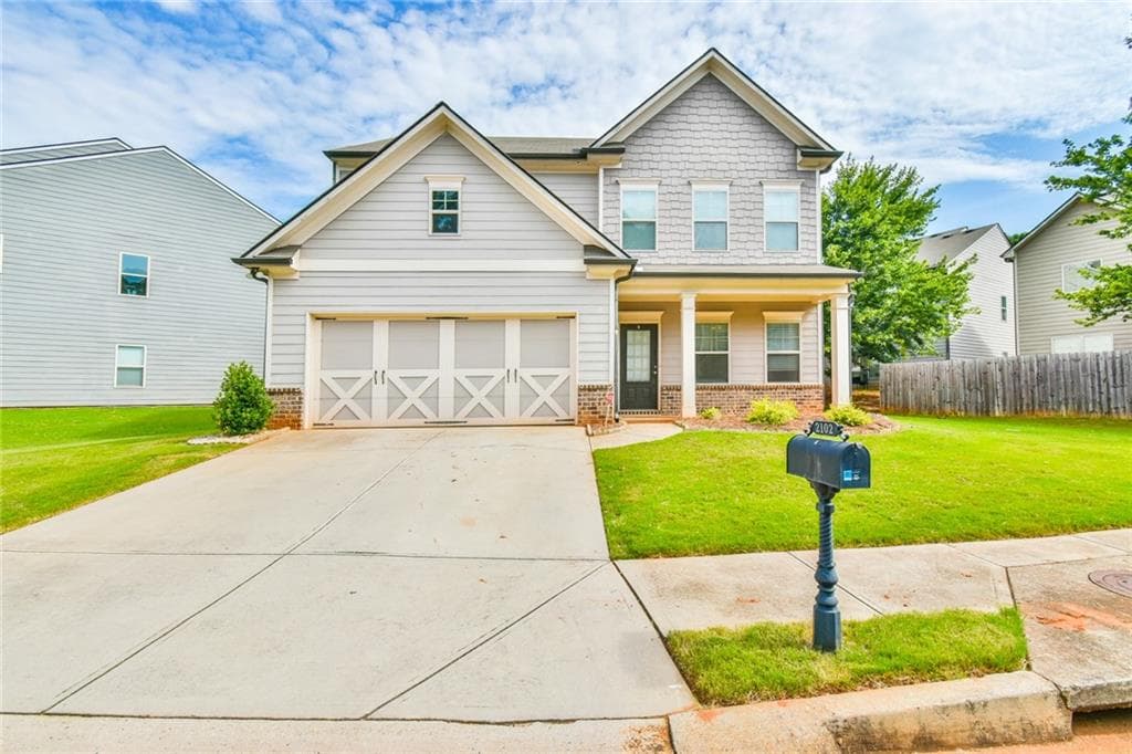4 bedroom, 3 bathroom, 2,112 sq ft single family residence sold at 2102 Black Pebble Circle, Buford, GA 30519
