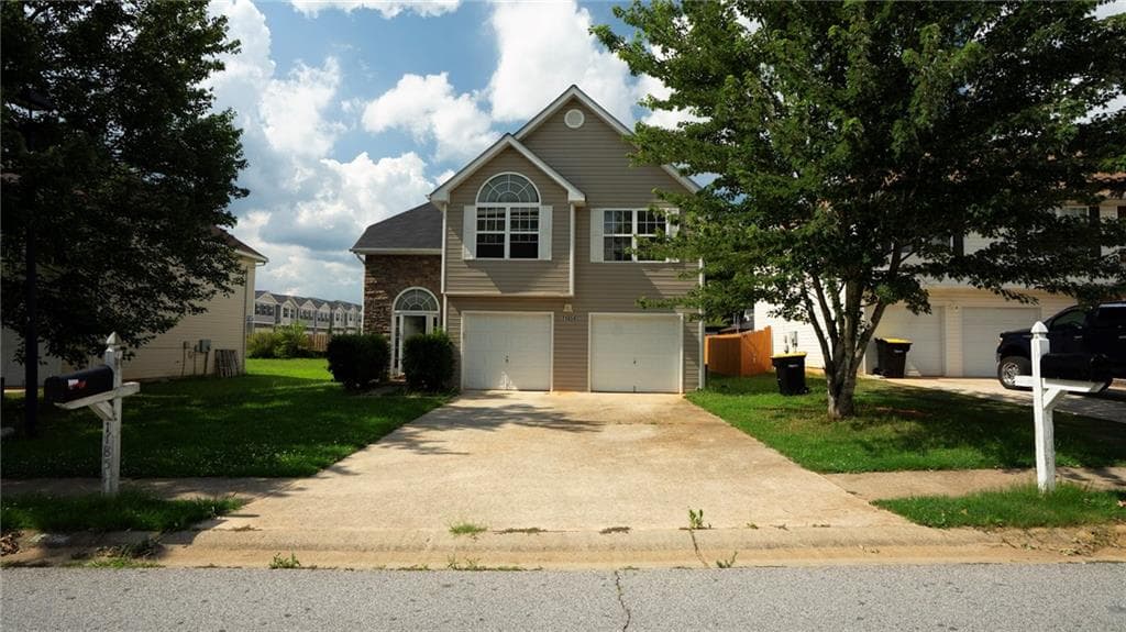 4 bedroom, 3 bathroom, 2,296 sq ft single family residence for sale at 11854 Registry Boulevard, Hampton, GA 30228 — photo 2