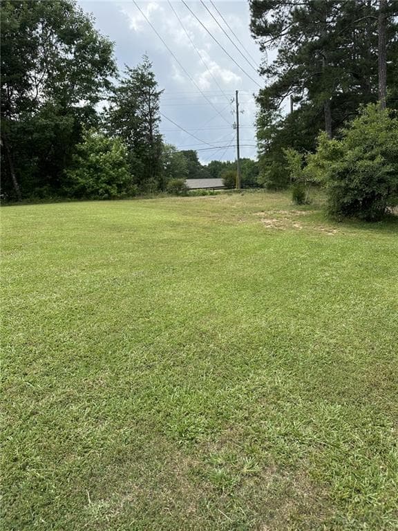 4 bedroom, 3 bathroom, 4,188 sq ft single family residence for sale at 5565 Hog Mountain Road, Flowery Branch, GA 30542 — photo 4