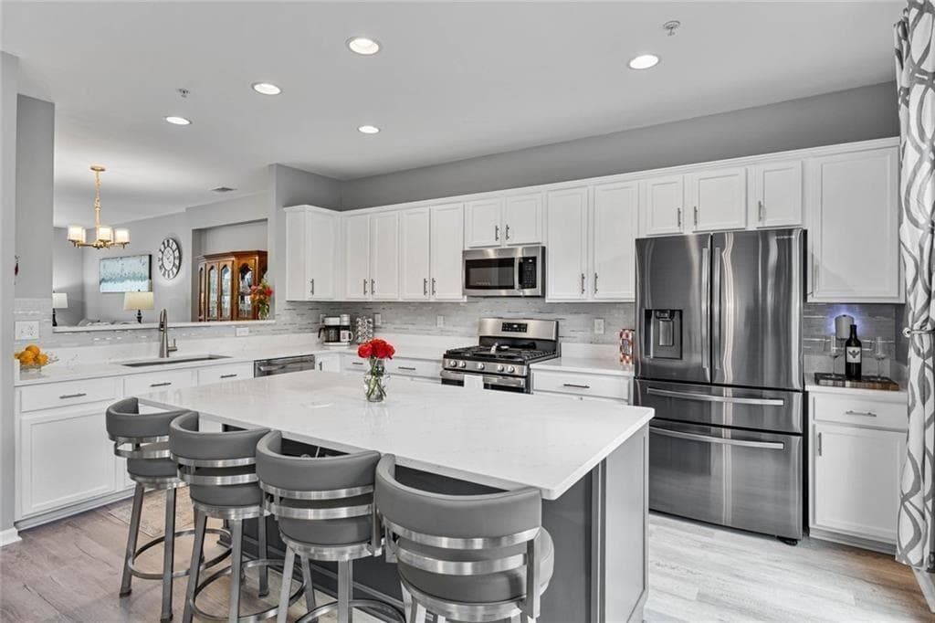 4 bedroom, 3 bathroom, 2,448 sq ft townhouse sold at 11352 Musette Circle, Alpharetta, GA 30009
