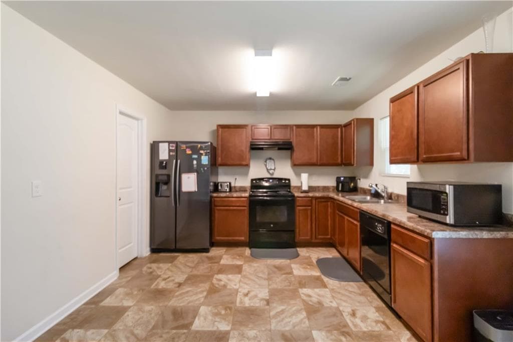 4 bedroom, 3 bathroom, 2,110 sq ft single family residence for sale at 5622 Laurel Ridge Drive, Atlanta, GA 30344 — photo 5