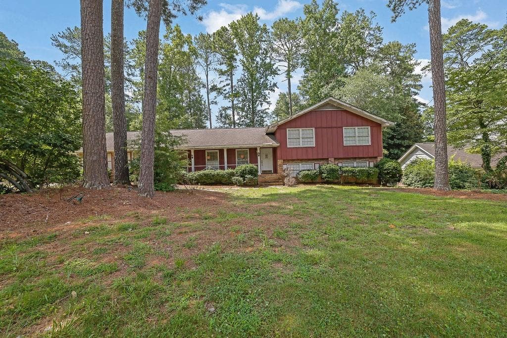 4 bedroom, 3 bathroom, 2,940 sq ft single family residence sold at 1653 Kings Down Circle, Atlanta, GA 30338