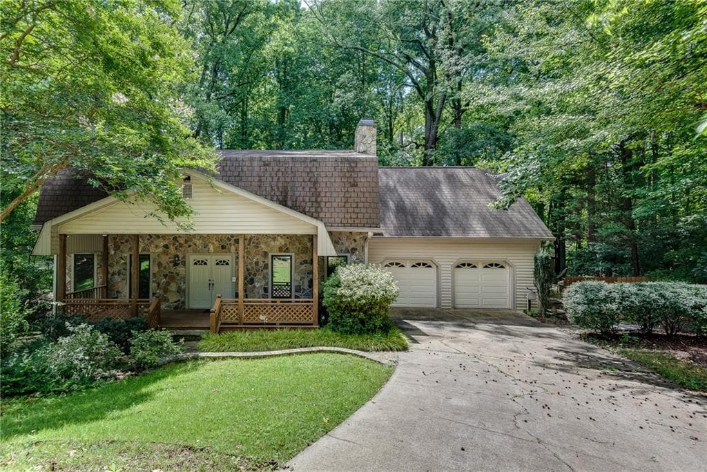 4 bedroom, 4 bathroom, 3,994 sq ft single family residence sold at 1667 Manhasset Farm Court, Atlanta, GA 30338