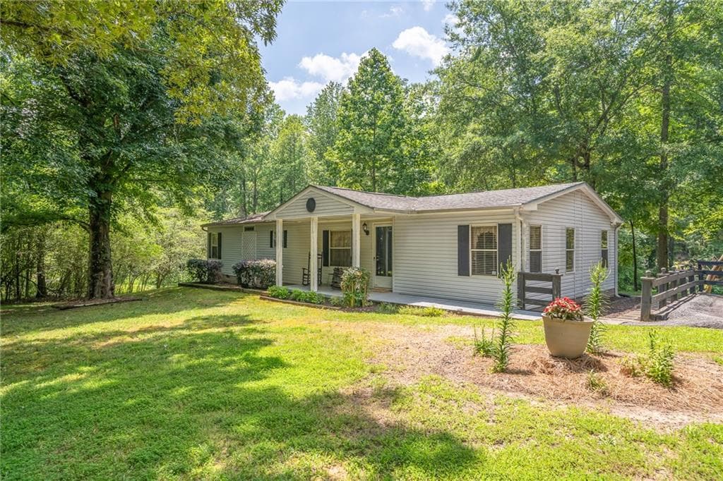 3 bedroom, 2 bathroom, 1,568 sq ft single family residence sold at 6155 Namon Wallace Road, Cumming, GA 30028