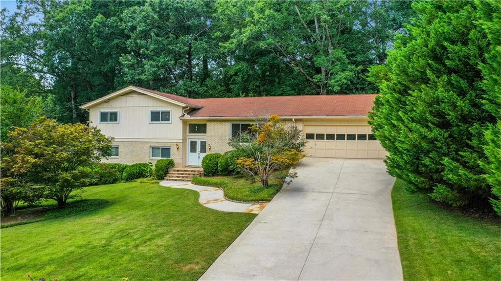 4 bedroom, 4 bathroom, 3,900 sq ft single family residence sold at 4916 Windhaven Court, Atlanta, GA 30338