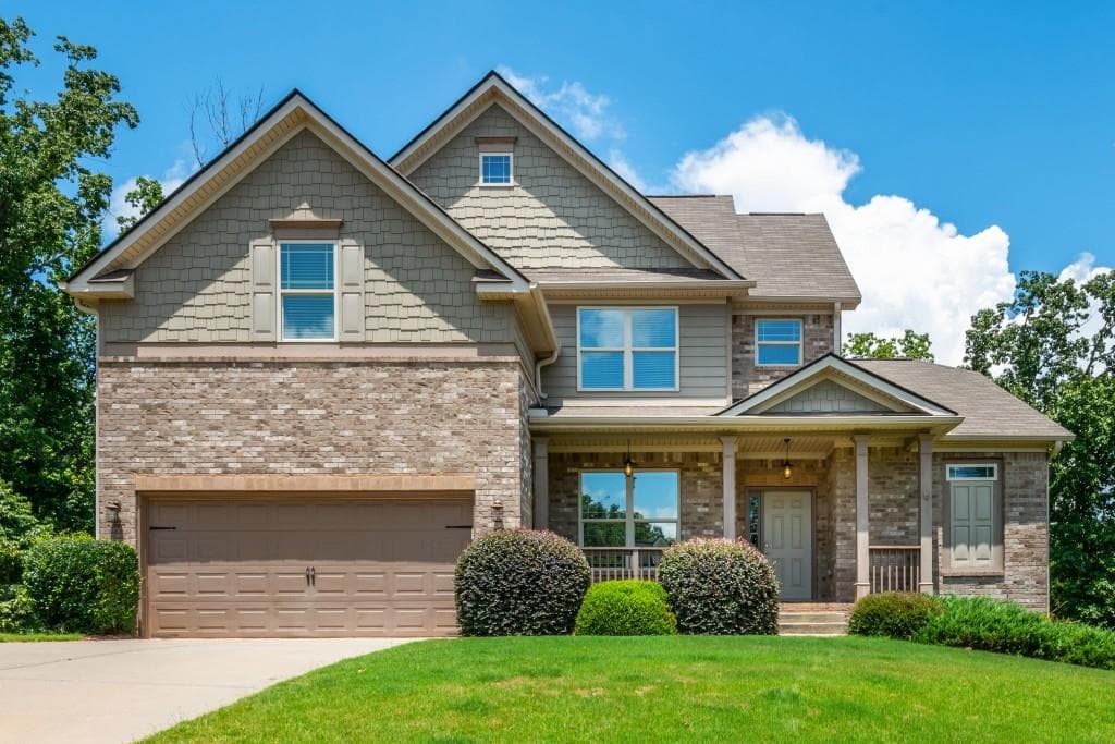 4 bedroom, 3 bathroom, 2,752 sq ft single family residence sold at 9445 Dunmoore Drive, Cumming, GA 30028
