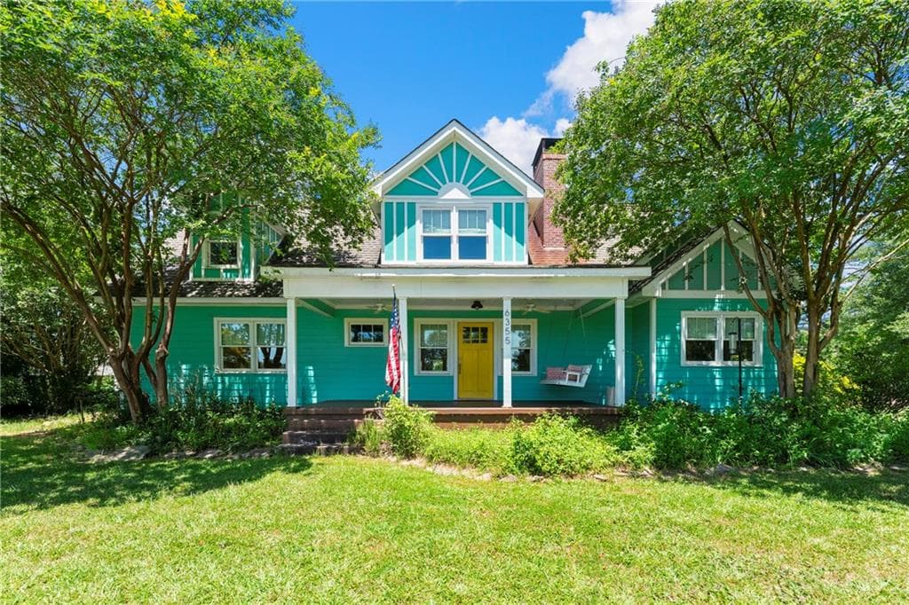 4 bedroom, 3 bathroom, 2,335 sq ft single family residence sold at 6355 Mockingbird Road, Cumming, GA 30028