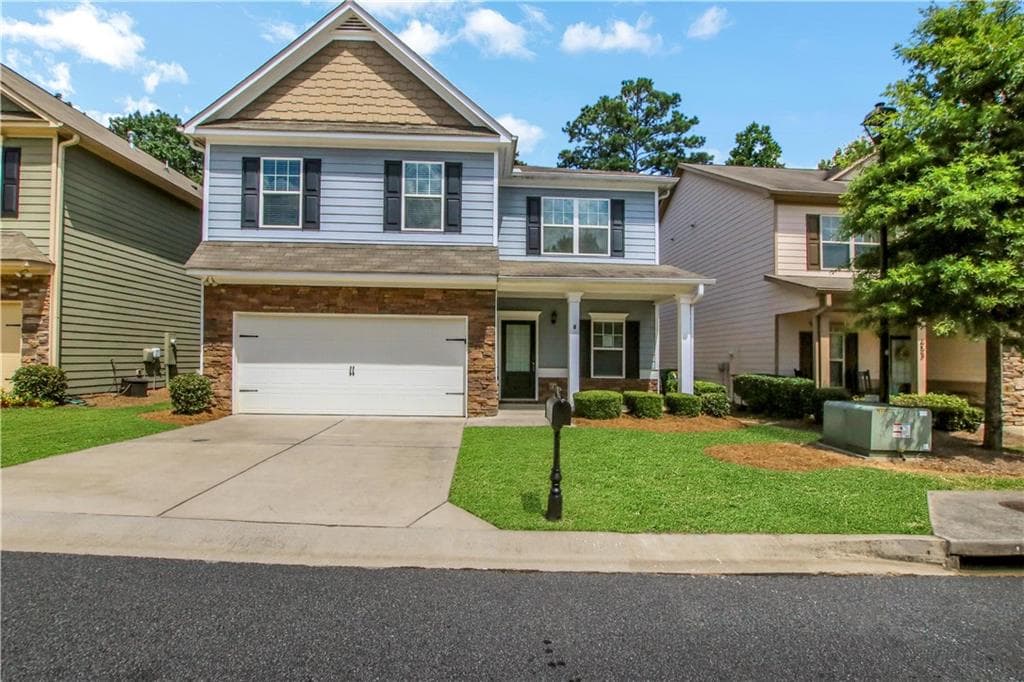 4 bedroom, 3 bathroom, 2,600 sq ft single family residence sold at 651 Georgia Way, Woodstock, GA 30188