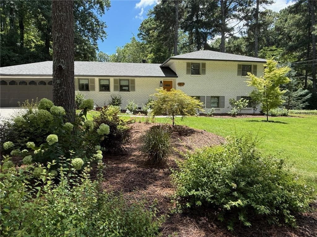 4 bedroom, 3 bathroom, 2,857 sq ft single family residence sold at 1977 Silvastone Drive, Atlanta, GA 30345