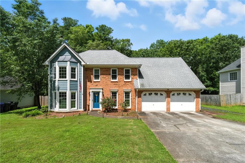 4 bedroom, 3 bathroom, 2,068 sq ft single family residence sold at 1313 Bustling Lane, Marietta, GA 30064