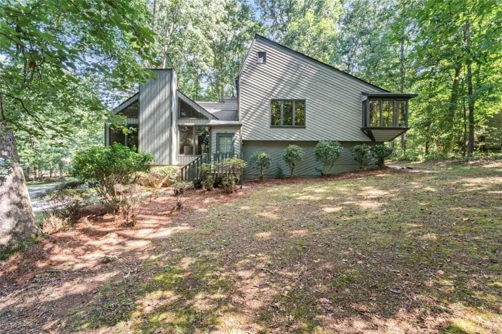 4 bedroom, 3 bathroom, 2,286 sq ft single family residence sold at 1909 Winding Creek Lane, Marietta, GA 30064