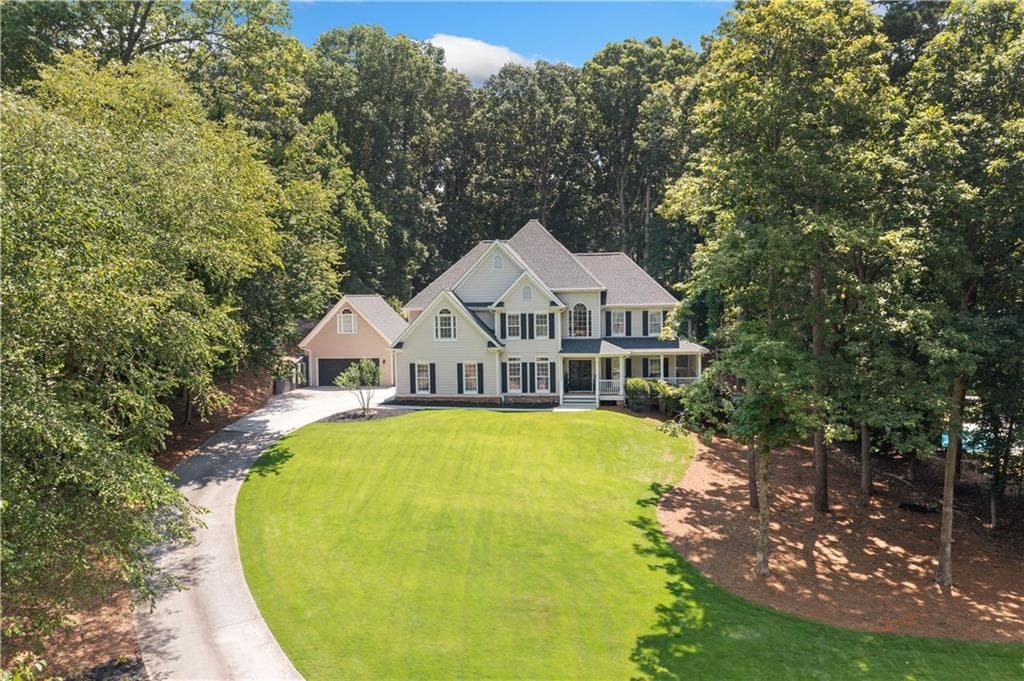 5 bedroom, 5 bathroom, 4,946 sq ft single family residence sold at 318 Windsor Falls Drive, Canton, GA 30114