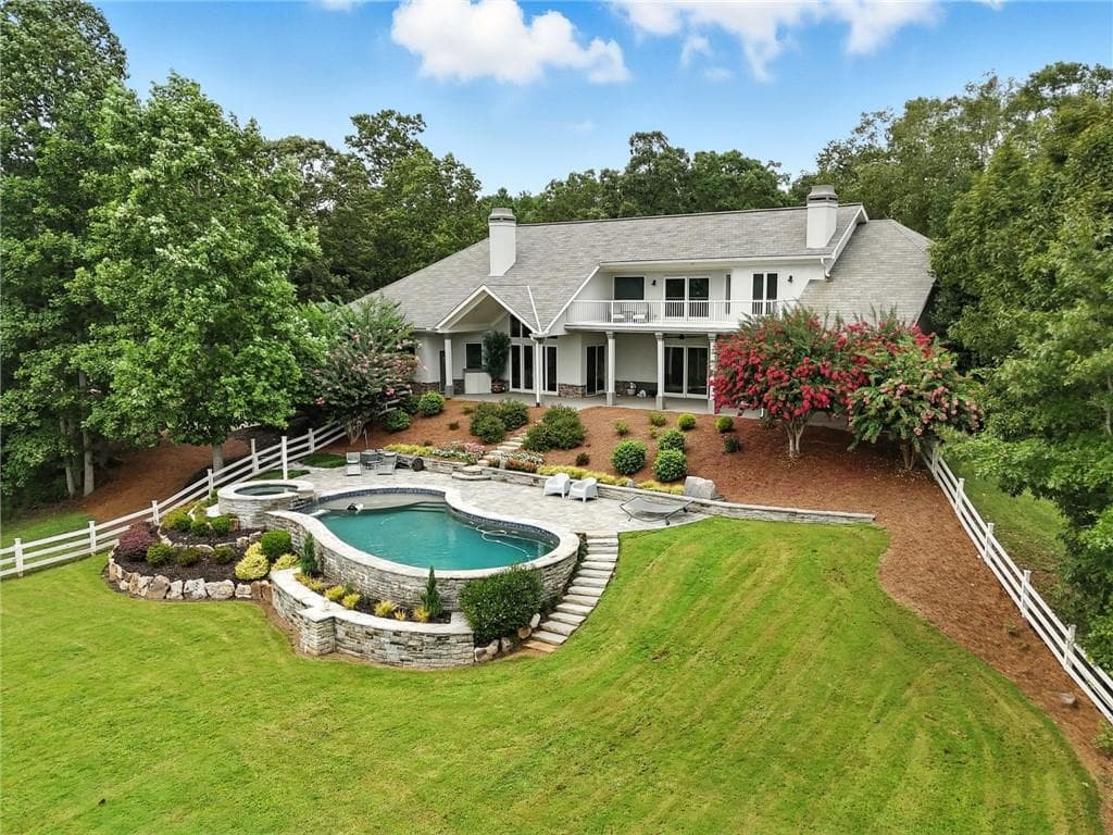 5 bedroom, 6 bathroom, 7,600 sq ft single family residence sold at 2150 Fincher Road, Canton, GA 30114