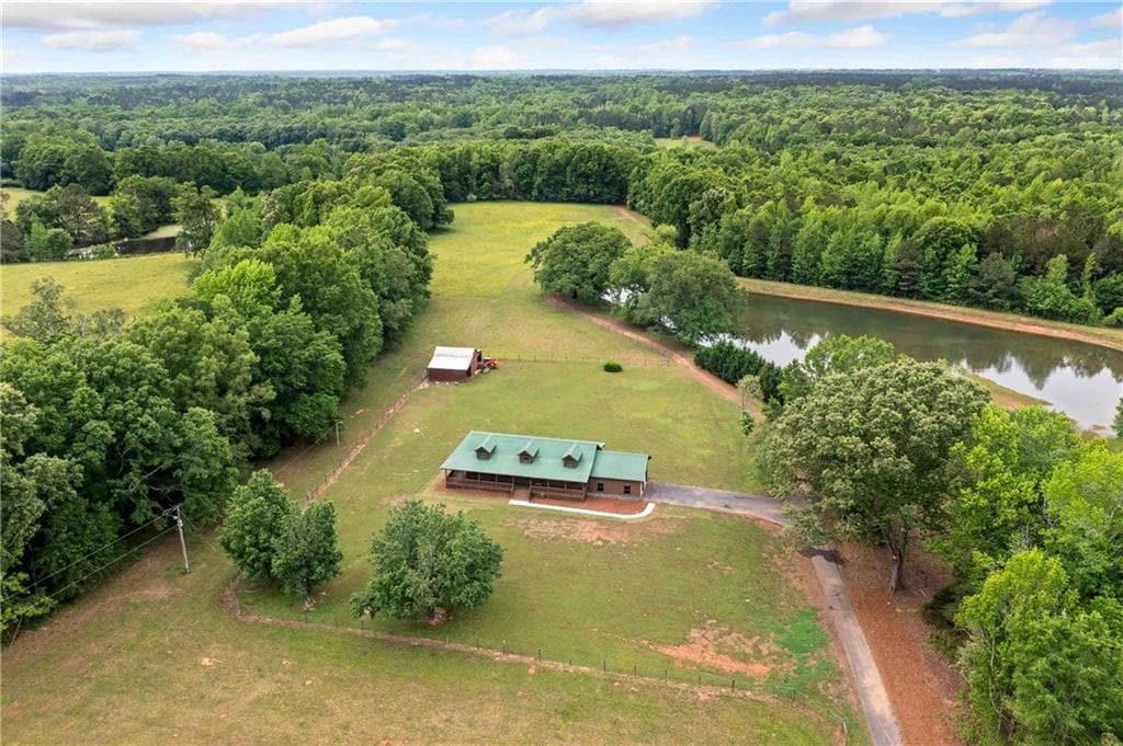 3 bedroom, 2 bathroom, 1,456 sq ft single family residence sold at 5002 Alvaton Road, Gay, GA 30218
