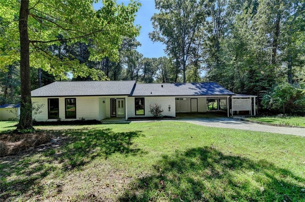 3 bedroom, 2 bathroom single family residence sold at 1192 Sandalwood Drive, Lawrenceville, GA 30043