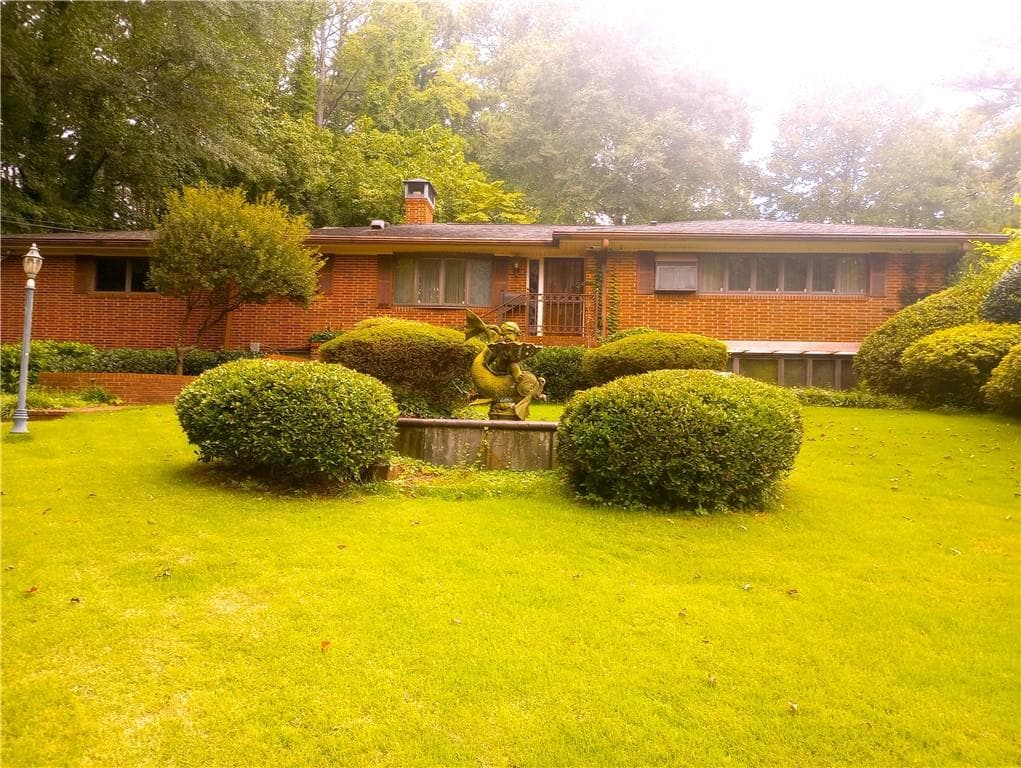 4 bedroom, 3 bathroom, 2,023 sq ft single family residence sold at 244 Chalmers Drive, Atlanta, GA 30318