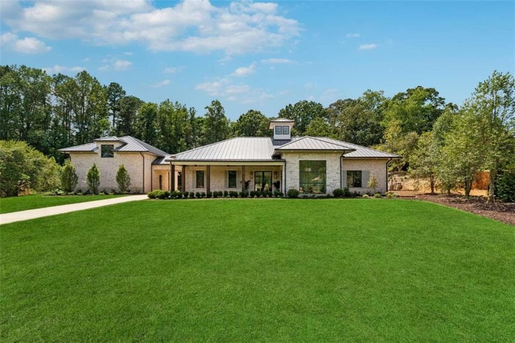 3 bedroom, 3 bathroom, 4,000 sq ft single family residence for sale at 4540 Natchez Lane, Cumming, GA 30040 — photo 2