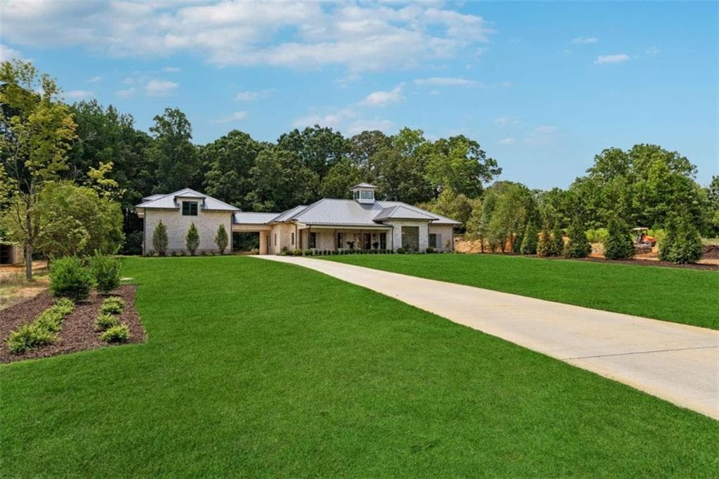 3 bedroom, 3 bathroom, 4,000 sq ft single family residence for sale at 4540 Natchez Lane, Cumming, GA 30040 — photo 3