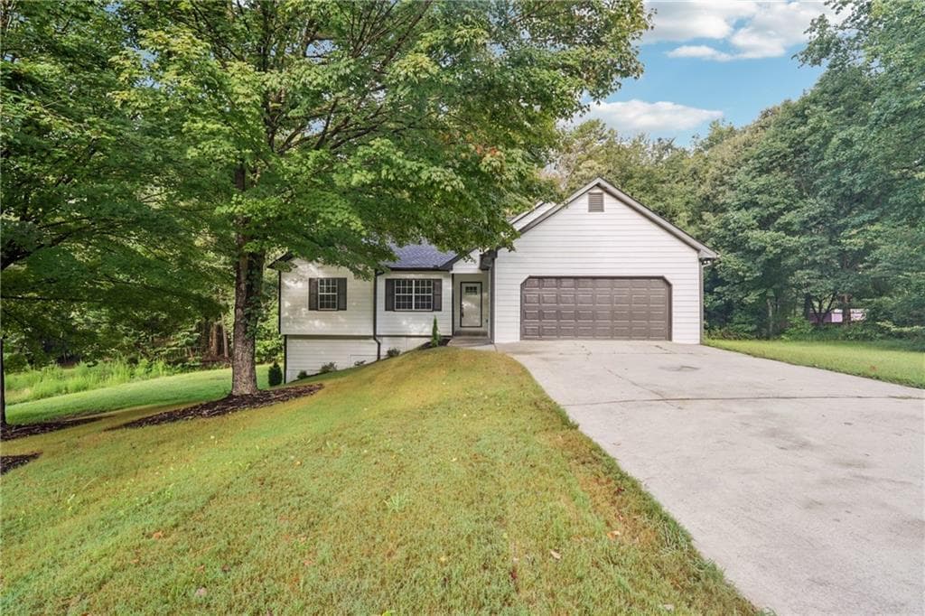 4 bedroom, 3 bathroom, 3,068 sq ft single family residence sold at 704 Poplar Springs Road, Hoschton, GA 30548