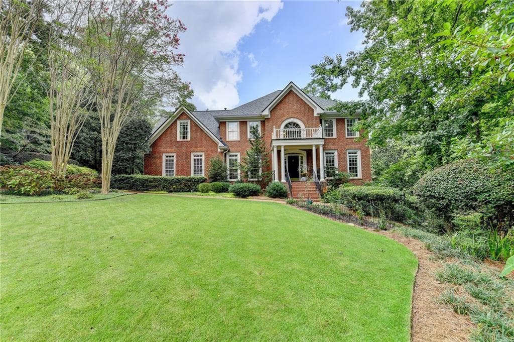 5 bedroom, 5 bathroom, 5,262 sq ft single family residence sold at 2911 Knob Hill Drive, Atlanta, GA 30339