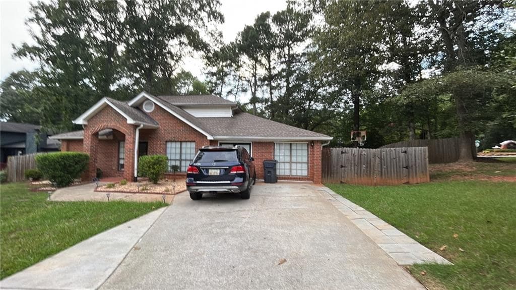4 bedroom, 3 bathroom, 2,642 sq ft single family residence sold at 2001 Hunters Cove Drive, Lawrenceville, GA 30044