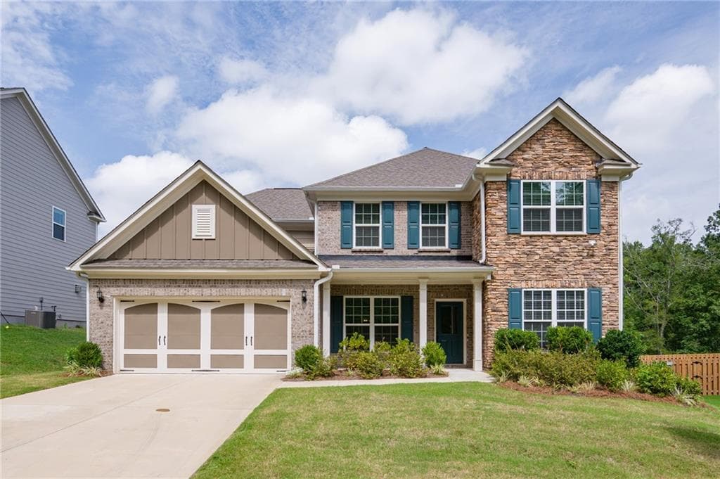 5 bedroom, 4 bathroom, 3,080 sq ft single family residence sold at 4910 Sierra Creek Drive, Hoschton, GA 30548